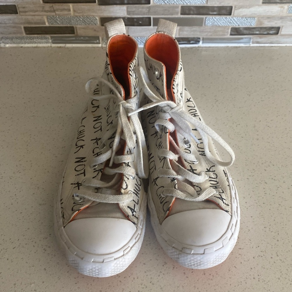Girls Converse “not a Chuck” shoes